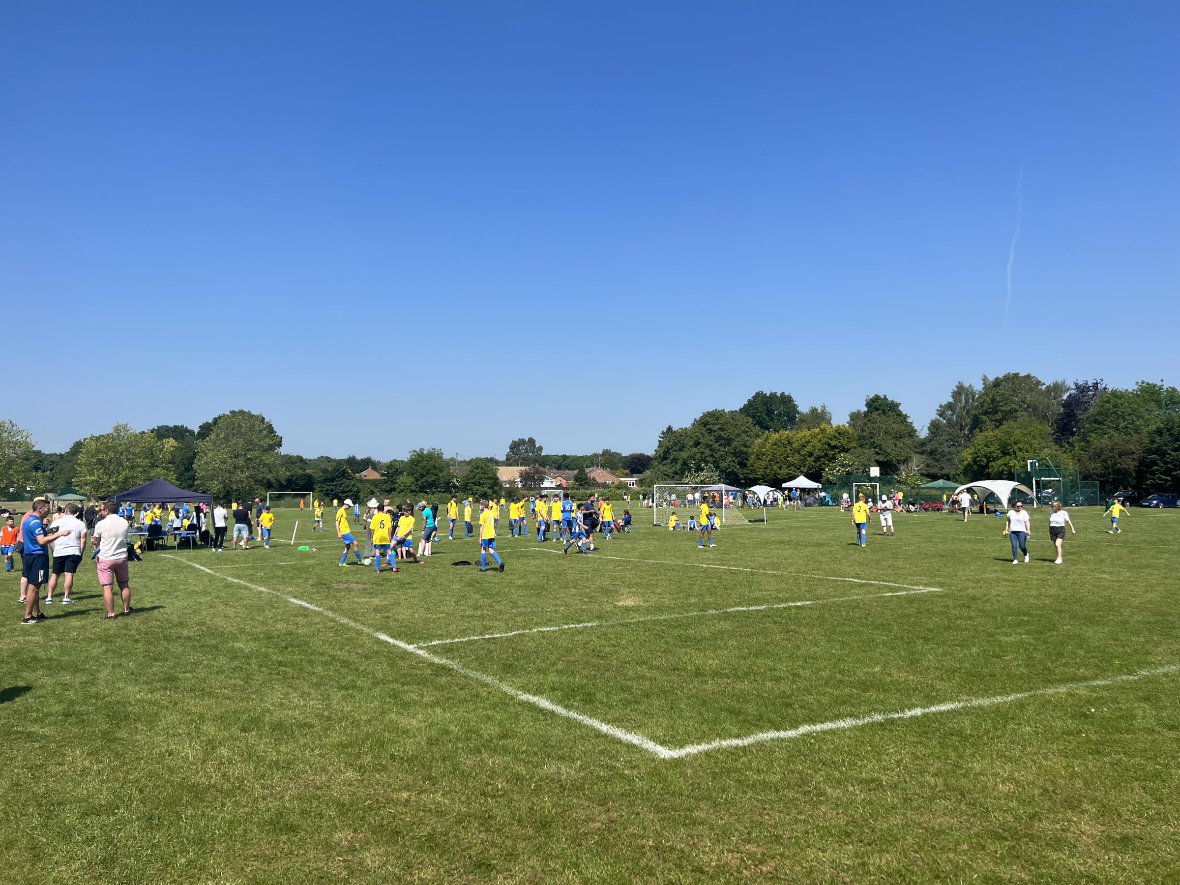 Bromham United AFC players and families on the village playing fields
